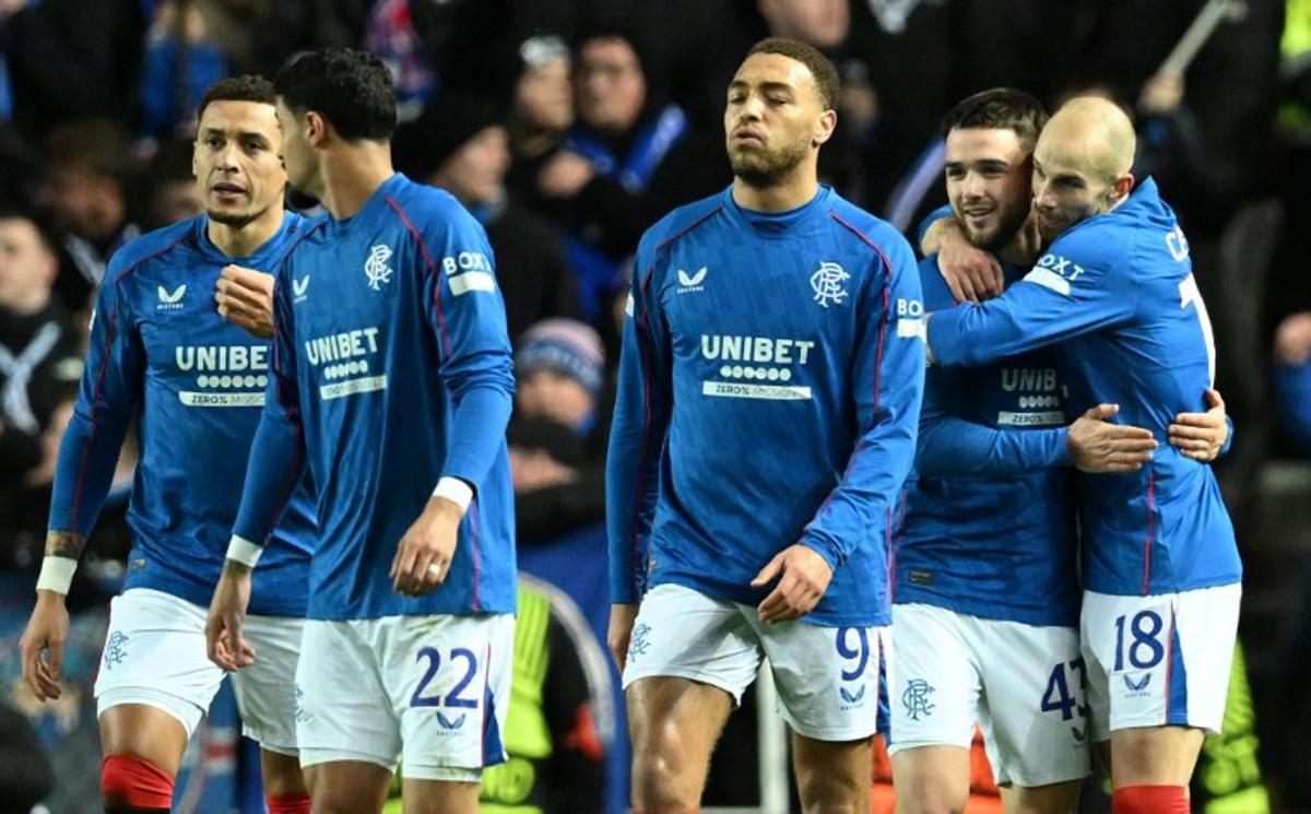 Rangers' Belgian midfielder #43 Nicolas Raskin (2R) celebrates scoring the opening goal during the UEFA Europa League football match between Rangers and Royale Union Saint-Gilloise at the Ibrox Stadium in Glasgow on January 30, 2025. ANDY BUCHANAN / AFP