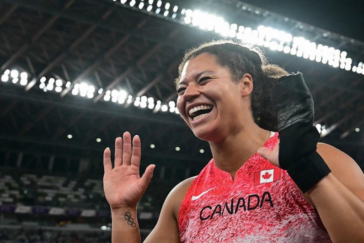 Gold medallist Canada's athlete Camryn Rogers celebrates after the women's hammer throw final during the World Athletics Championships in Tokyo on September 15, 2025. Ben STANSALL / AFP