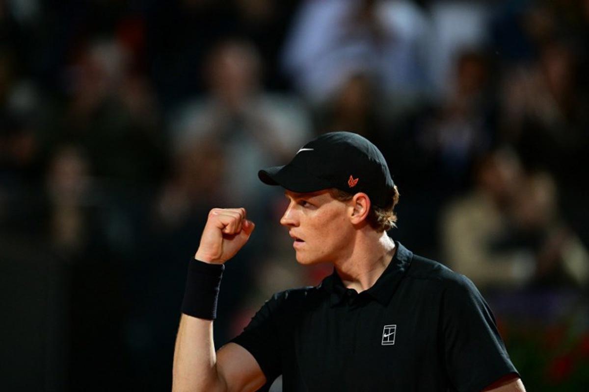 Italy's Jannik Sinner reacts during his men's singles semi-final match against USA's Tommy Paul for the ATP Rome Open tennis tournament at Foro Italico in Rome on May 16, 2025. Tiziana FABI / AFP