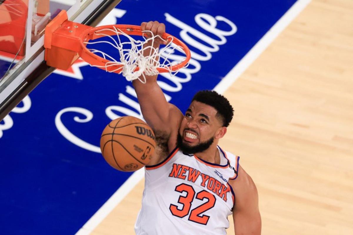 Knicks' center #32 Karl-Anthony Towns reacts after a dunk during Game Five of the Eastern Conference Finals of the 2025 NBA Playoffs between the New York Knicks and the Indiana Pacers at Madison Square Garden in New York on May 29, 2025. CHARLY TRIBALLEAU / AFP