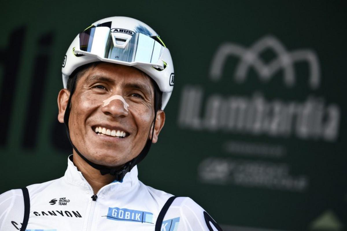 Movistar Team's Colombian riderNairo Quintana looks on from the sign-in podium ahead of the 119th edition of the Giro di Lombardia (Tour of Lombardy), a 238km cycling race from Como to Bergamo on October 11, 2025. Marco BERTORELLO / AFP