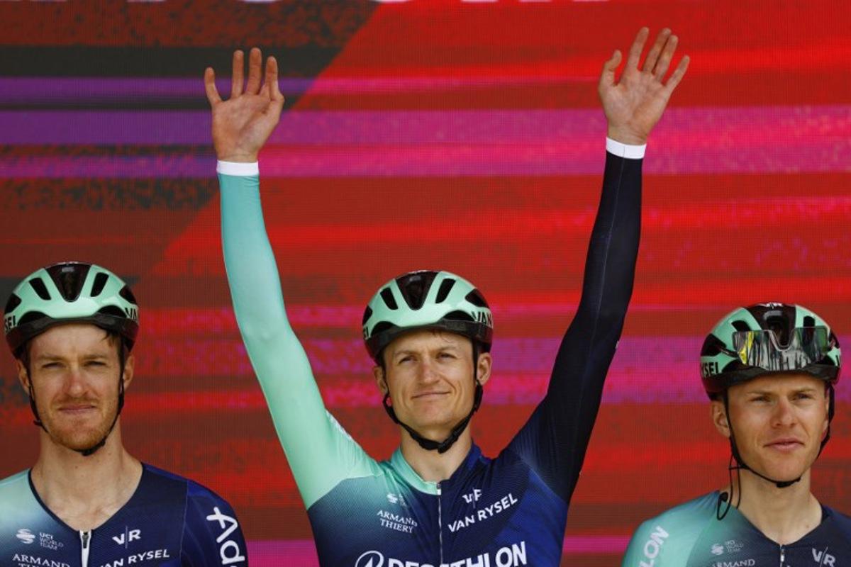 Decathlon CMA CGM Team Austrian rider Felix Gall (C) looks on during the presentation of the teams prior the 1st stage of the Giro d'Italia 2026 - Tour of Italy cycling race between Nessebar and Burgas, Bulgaria, on May 8, 2026. Luca Bettini / AFP