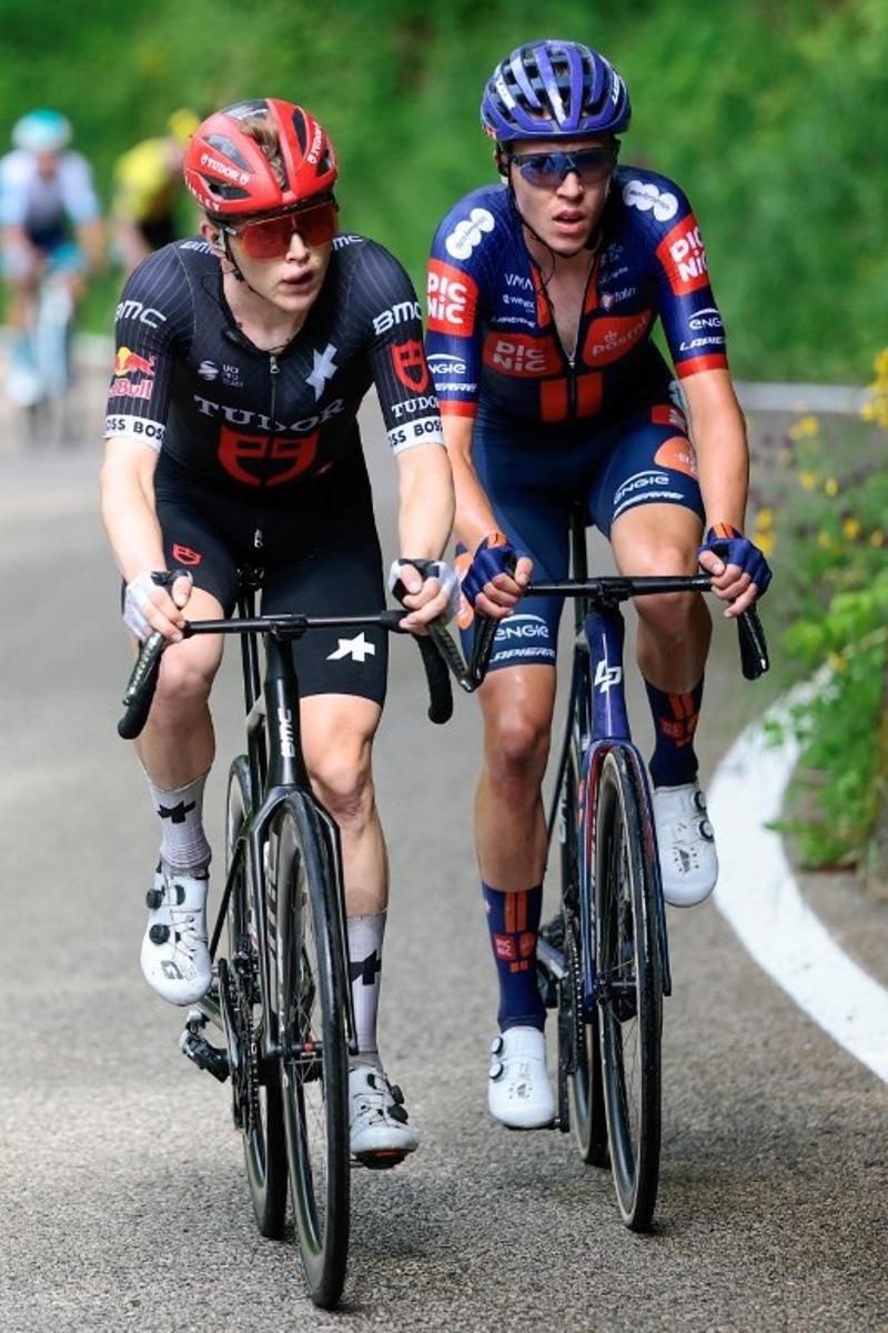 Tudor Pro Cycling Team's Australian rider Michael Storer (L) and Team Picnic PostNL's British rider Max Poole climb Santa Barbara during the 16th stage of the 108th Giro d'Italia cycling race of 203kms from Piazzola sul Brenta to San Valentino on May 27, 2025. Luca Bettini / AFP