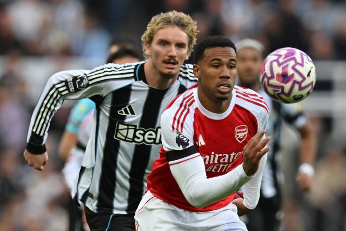 Arsenal's Brazilian defender #06 Gabriel Magalhaes chases the ball during the English Premier League football match between Newcastle United and Arsenal at St James' Park in Newcastle-upon-Tyne, north east England on September 28, 2025. ANDY BUCHANAN / AFP
