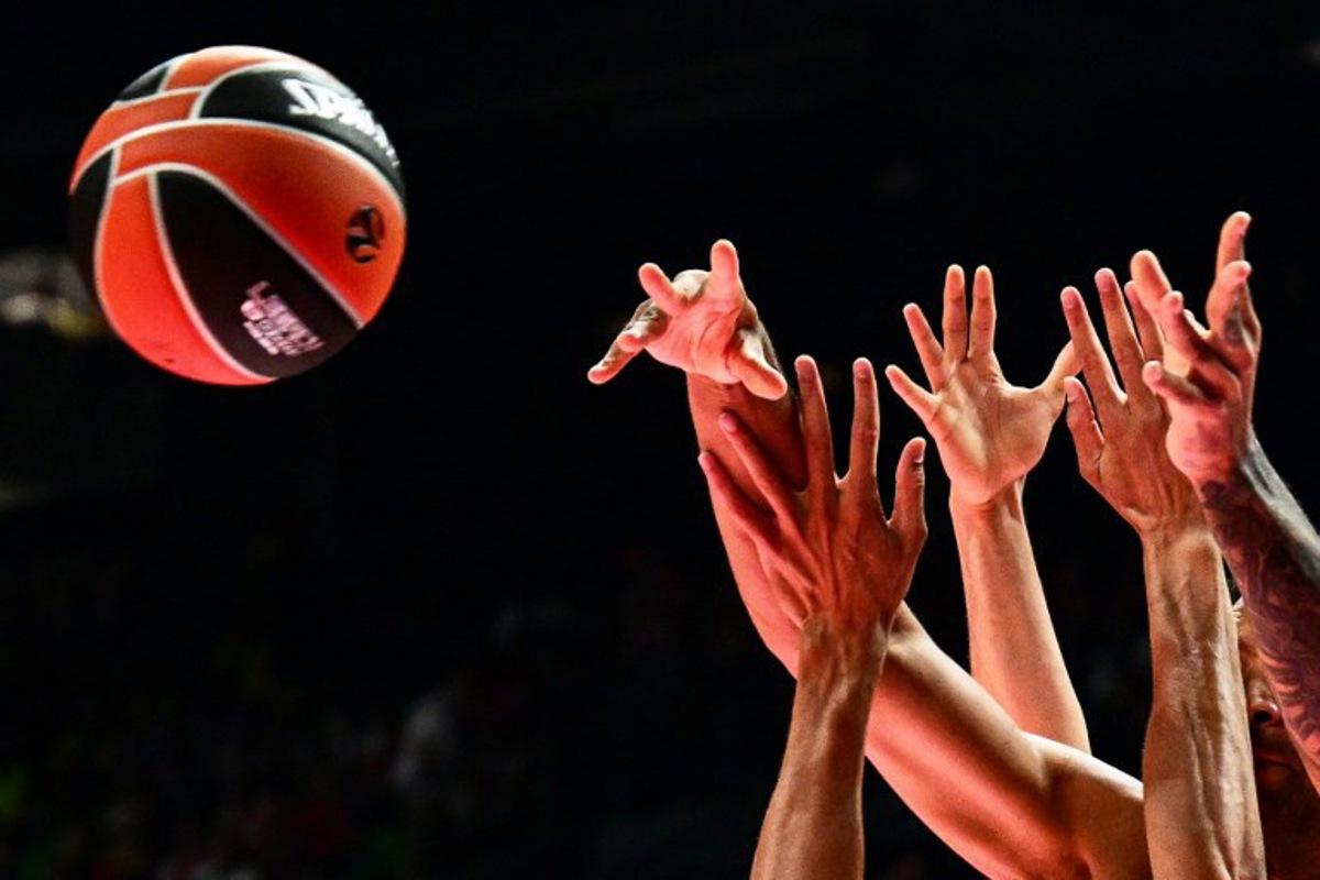 Players jump for the ball during the EuroLeague "Final Four" semi-final basketball match between Valencia Basket Club and Real Madrid Baloncesto at the Telekom Center Athens in Athens on May 22, 2026. Angelos TZORTZINIS / AFP