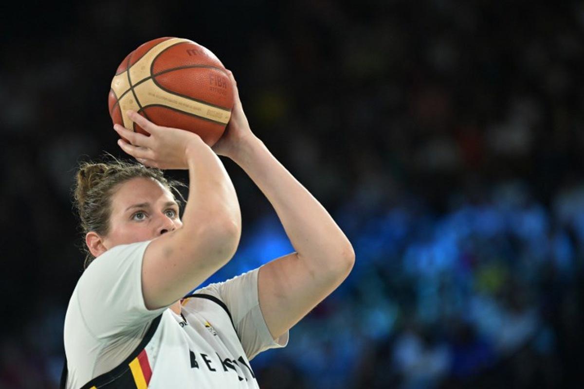 Belgium's #13 Kyara Linskens takes a free throw in the women's Bronze Medal basketball match between Belgium and Australia during the Paris 2024 Olympic Games at the Bercy Arena in Paris on August 11, 2024. Damien MEYER / AFP