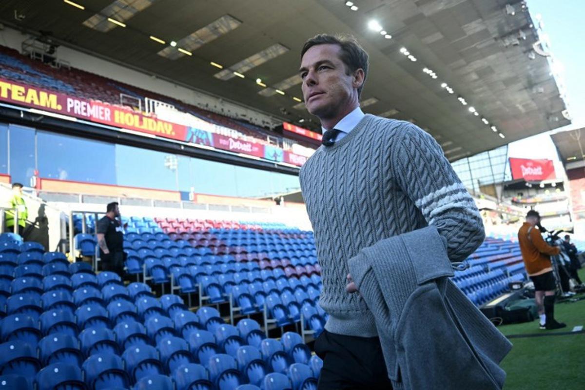 Burnley's English manager Scott Parker arrives before the English Premier League football match between Burnley and Manchester City at Turf Moor in Burnley, north-west England on April 22, 2026. Paul ELLIS / AFP