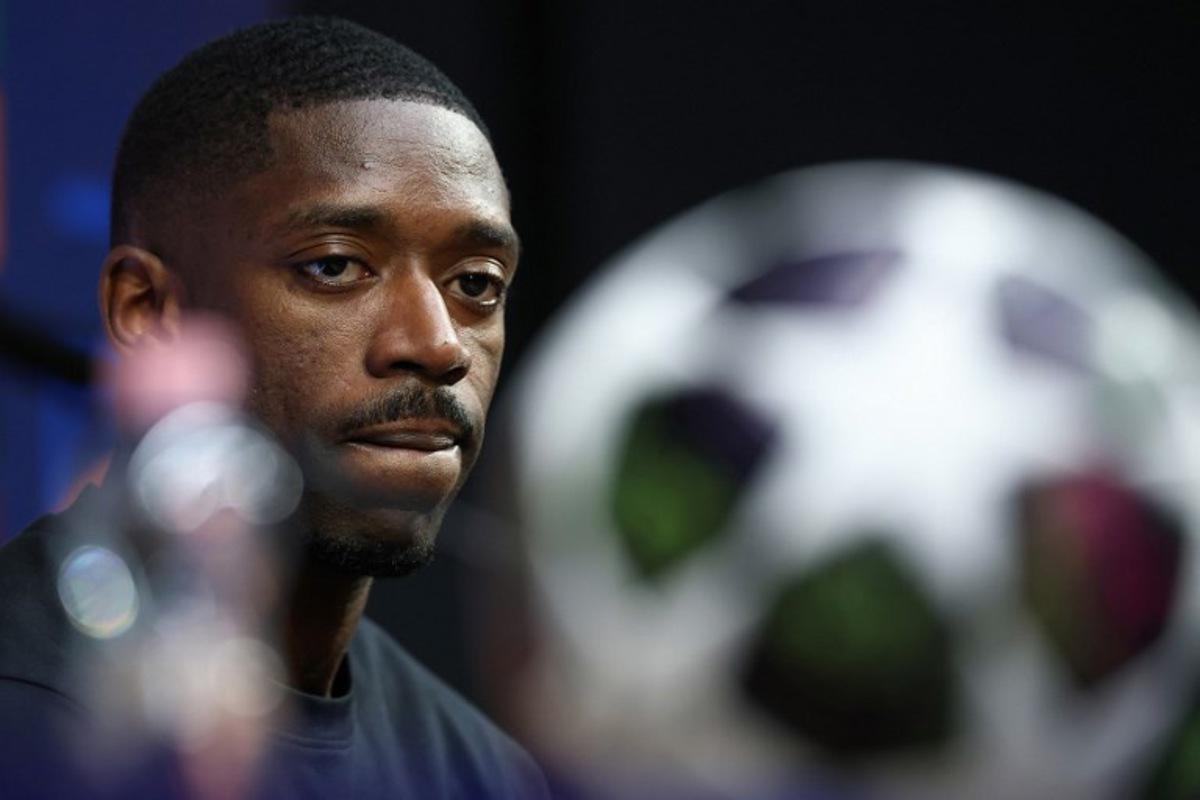 Paris Saint-Germain's French forward #10 Ousmane Dembele addresses a MD-1 press conference on May 29, 2026, the eve of the UEFA Champions League final football match between Paris Saint-Germain (PSG) and Arsenal at the Puskas Arena in Budapest. Paris Saint-Germain (PSG) face Arsenal in the UEFA Champions League final football match on May 30, 2026 in Budapest. FRANCK FIFE / POOL / AFP