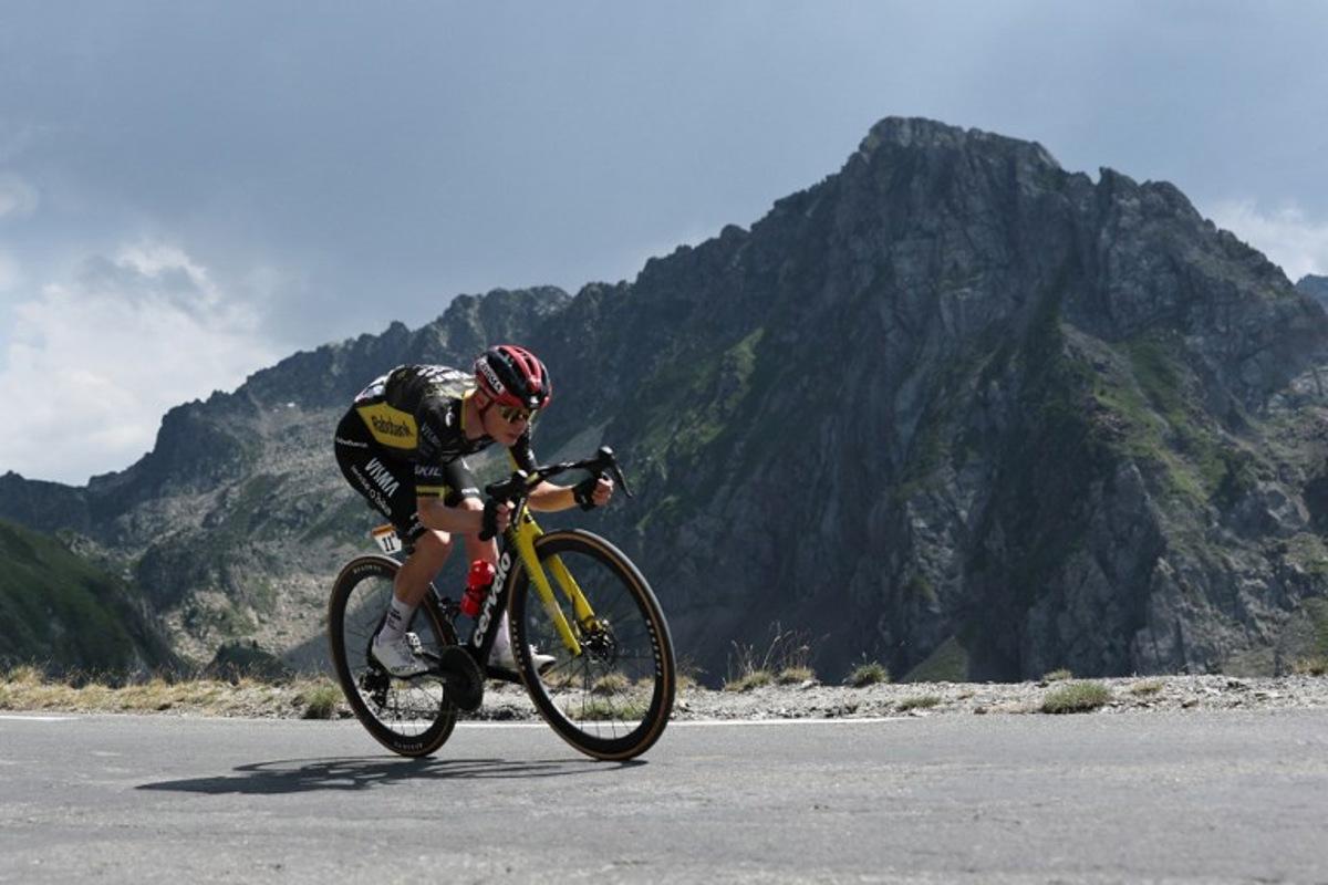 Team Visma | Lease a Bike's Danish rider Jonas Vingegaard cycle in the descent of Col du Tourmalet during the 6th stage of the 113th edition of the Tour de France cycling race, 186,2 km between Pau and Gavarnie-Gèdre in the French Pyrenees, on July 9, 2026. Anne-Christine POUJOULAT / AFP