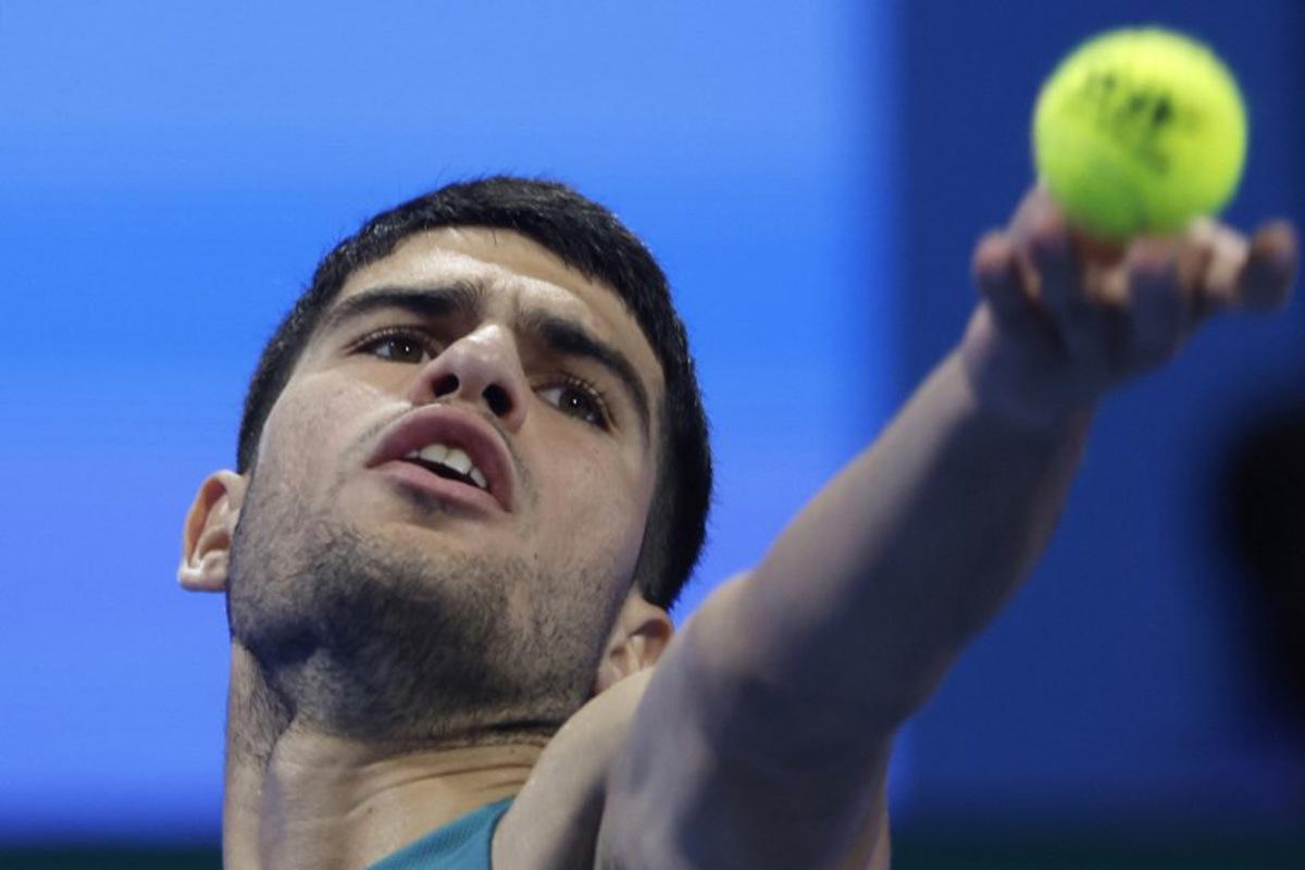 Spain's Carlos Alcaraz serves the ball to Croatia's Marin Cilic during their men's singles match at the ATP Qatar Open tennis tournament in Doha on February 17, 2025.. KARIM JAAFAR / AFP