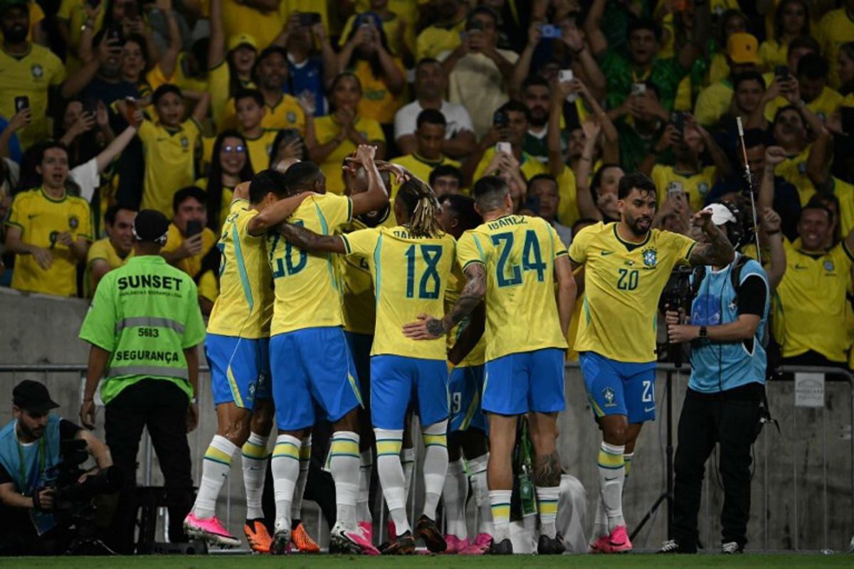 Brazil's forward #25 Igor Thiago (C, unseen) celebrates a penalty goal with teammates during the international friendly football match between Brazil and Panama at the Maracana stadium in Rio de Janeiro, Brazil on May 31, 2026. Mauro PIMENTEL / AFP