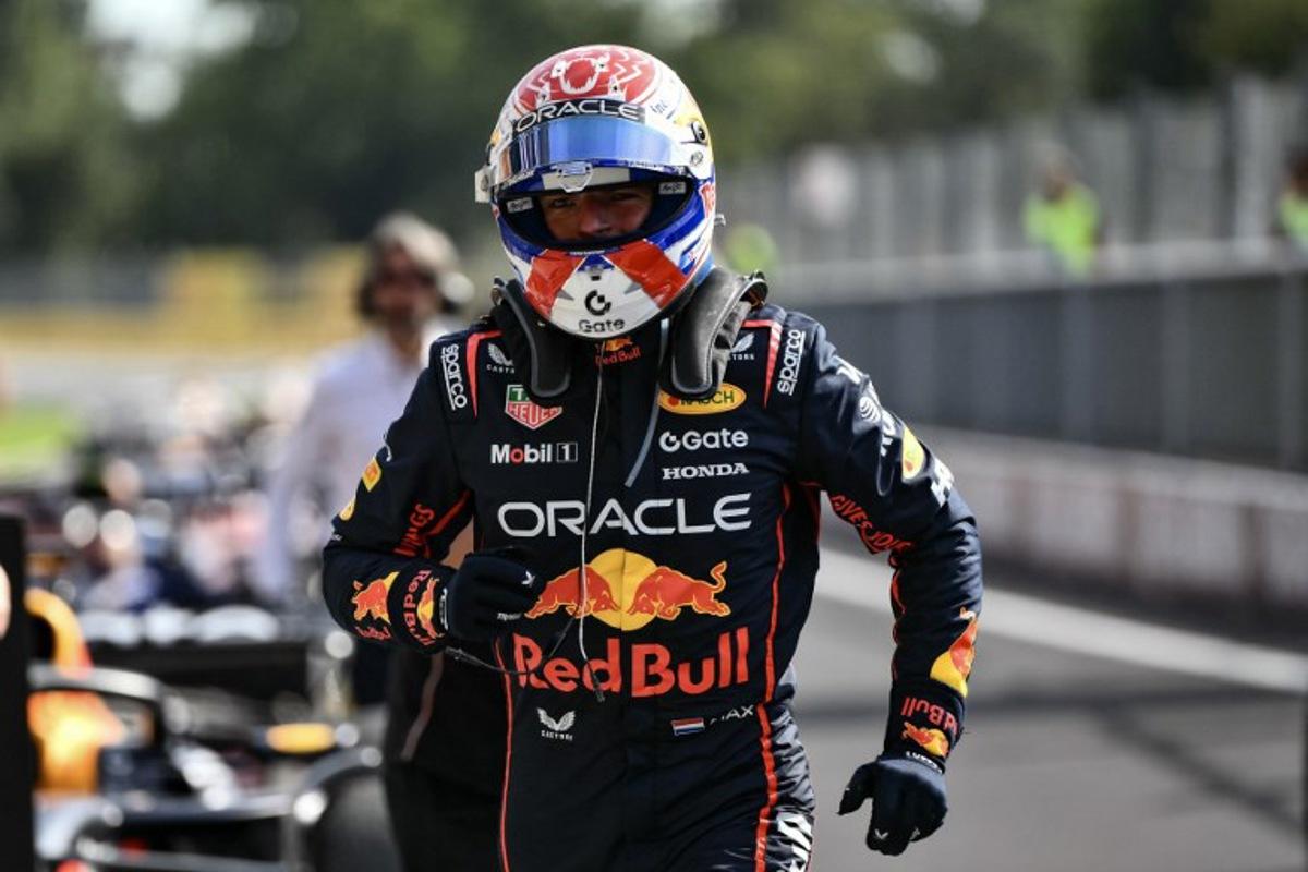 Red Bull Racing's Dutch driver Max Verstappen celebrates after winning the Italian Formula One Grand Prix at the Autodromo Nazionale Monza circuit, in Monza, northern Italy, on September 7, 2025. Marco BERTORELLO / AFP