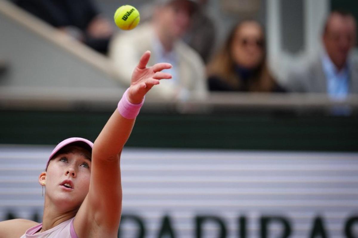 Mirra Andreeva serves to Ukraine's Marta Kostyuk during their women's semi final singles match on day 12 of the French Open tennis tournament on Court Philippe-Chatrier at the Roland-Garros Complex in Paris on June 4, 2026. Dimitar DILKOFF / AFP