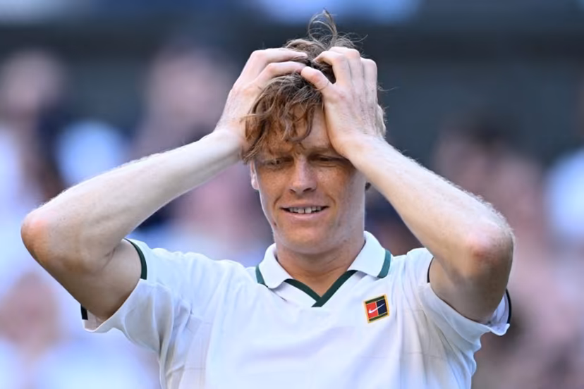 Italy's Jannik Sinner reacts to beating Germany's Alexander Zverev during their men's singles final tennis match on the fourteenth day of the 2026 Wimbledon Championships at The All England Lawn Tennis and Croquet Club in Wimbledon, southwest London, on July 12, 2026. Kirill KUDRYAVTSEV / AFP
