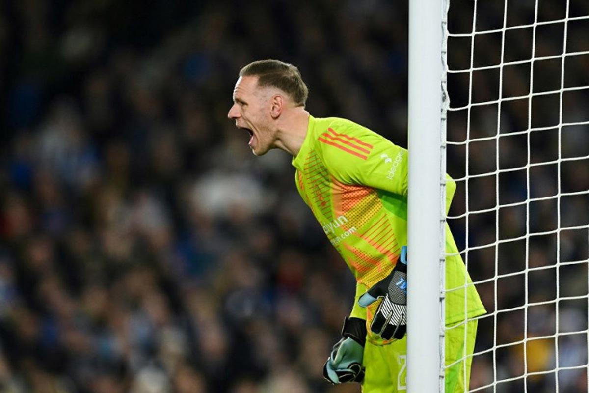Nottingham Forest's Belgian goalkeeper #26 Matz Sels reacts during the English FA Cup quarter-final football match between Brighton & Hove Albion and Nottingham Forest at the Amex stadium, in Brighton, on March 29, 2025. Glyn KIRK / AFP