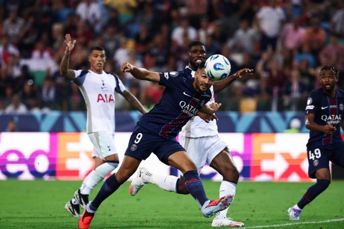 Paris Saint-Germain's Portuguese forward #09 Goncalo Ramos heads the ball to score PSG's second goal during the 2025 UEFA Super Cup final football match between Paris Saint-Germain (FRA) and Tottenham Hotspur FC (ENG) at the Friuli stadium, in Udine, on August 13, 2025. FRANCK FIFE / AFP