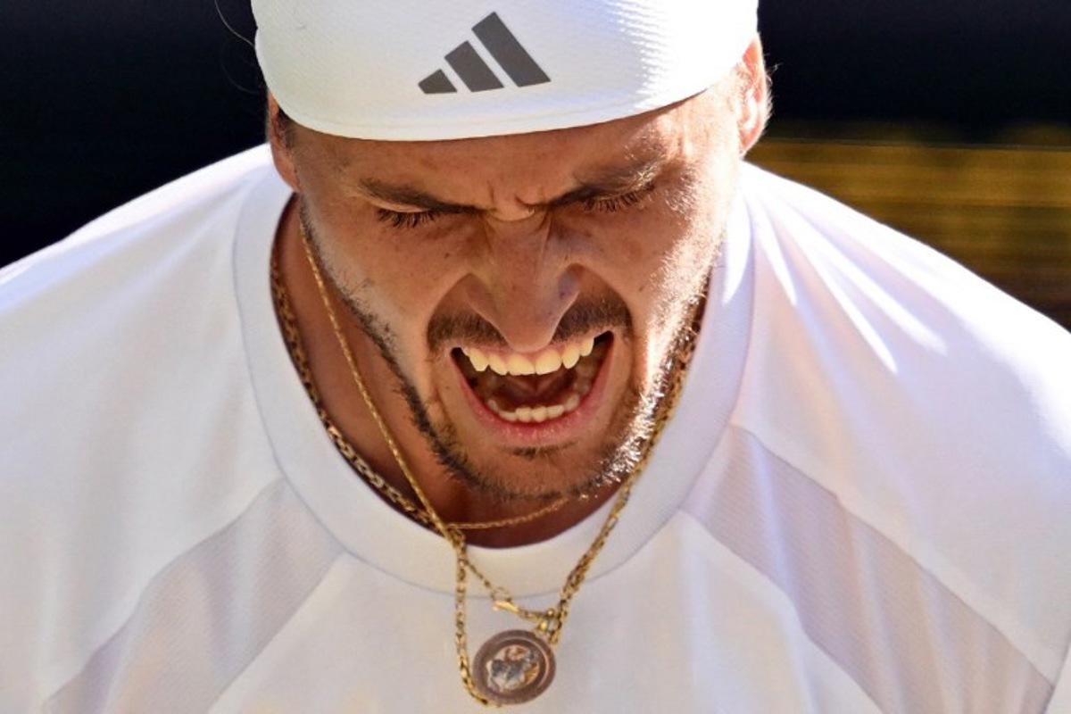 Germany's Alexander Zverev reacts as he plays against Italy's Jannik Sinner during their men's singles final tennis match on the fourteenth day of the 2026 Wimbledon Championships at The All England Lawn Tennis and Croquet Club in Wimbledon, southwest London, on July 12, 2026. Kirill KUDRYAVTSEV / AFP