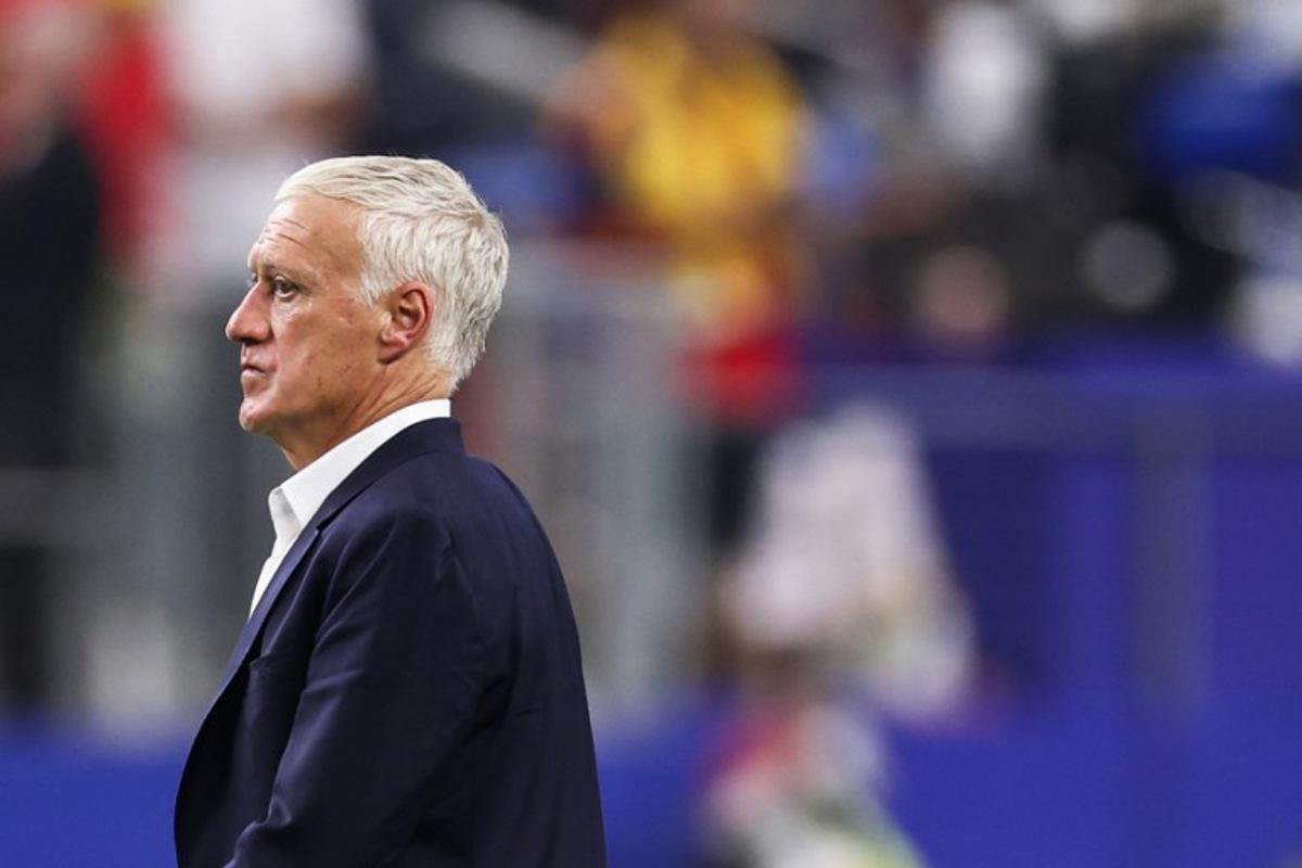 France's head coach Didier Deschamps leaves the pitch after losing the 2026 World Cup football tournament semi-final match between France and Spain at the Dallas Stadium in Arlington on July 14, 2026. FRANCK FIFE / AFP
