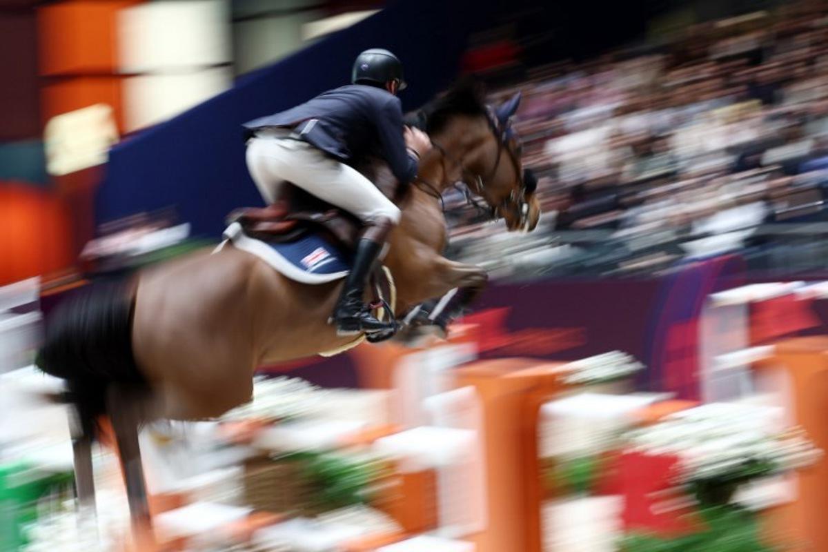 England's Joseph Stockdale riding Millfield Counterfeit competes during the "Le Saut Hermes CSI 5*" International Jumping Competition at the Grand Palais Ephemere in Paris, on March 16, 2024. FRANCK FIFE / AFP