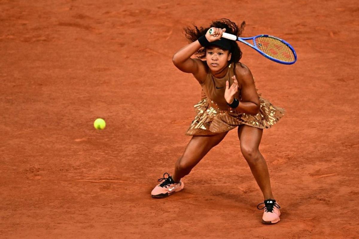 Japan's Naomi Osaka plays a forehand return to Aryna Sabalenka during their women's singles match on day 9 of the French Open tennis tournament on Court Philippe-Chatrier at the Roland-Garros Complex in Paris on June 1, 2026. JULIEN DE ROSA / AFP