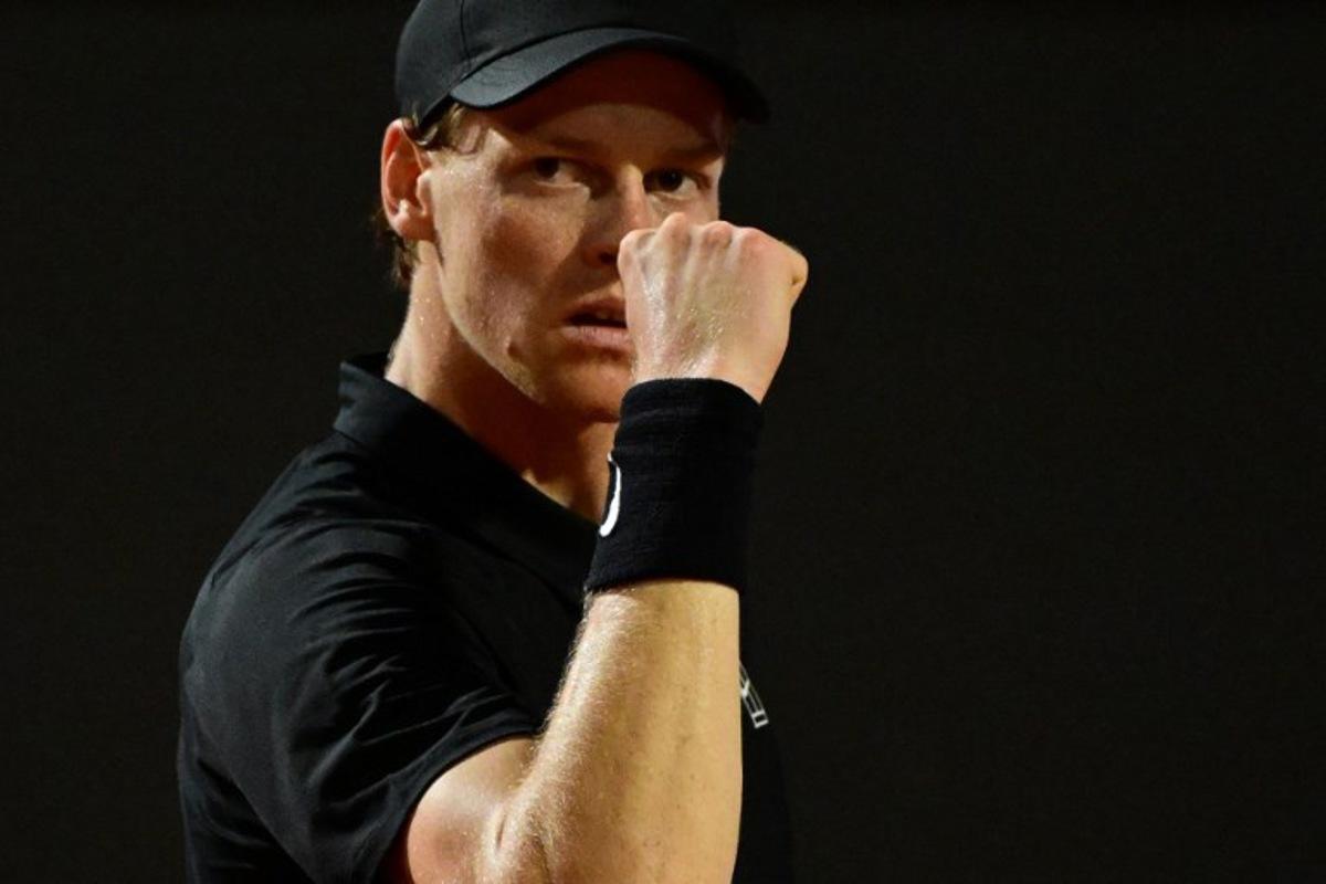 Italy's Jannik Sinner reacts during his match against Argentine's Francisco Cerundolo at the ATP Rome Open tennis tournament at Foro Italico in Rome on May 13, 2025. Piero CRUCIATTI / AFP