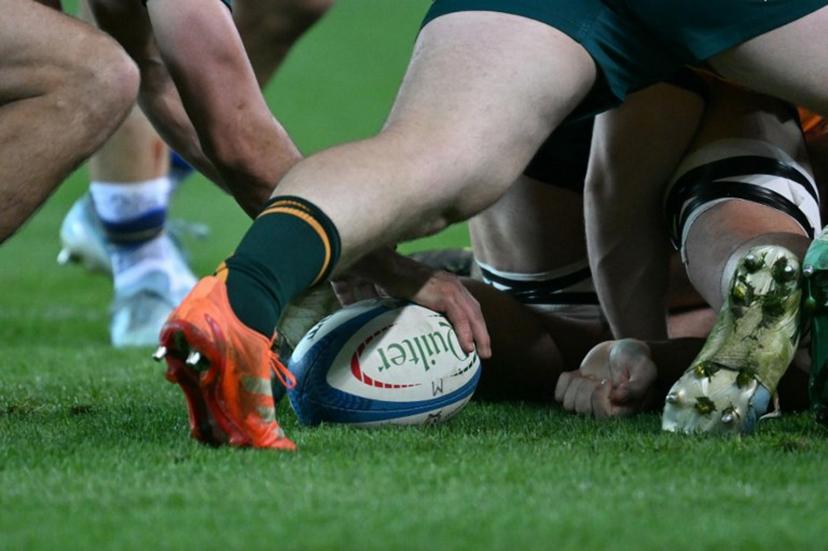 Australian players clear the ball in a scrum during the Autumn Nations Series international rugby union match between Italy and Australia (wallabies) at the Friuli stadium in Udine on November 8, 2025. Stefano RELLANDINI / AFP