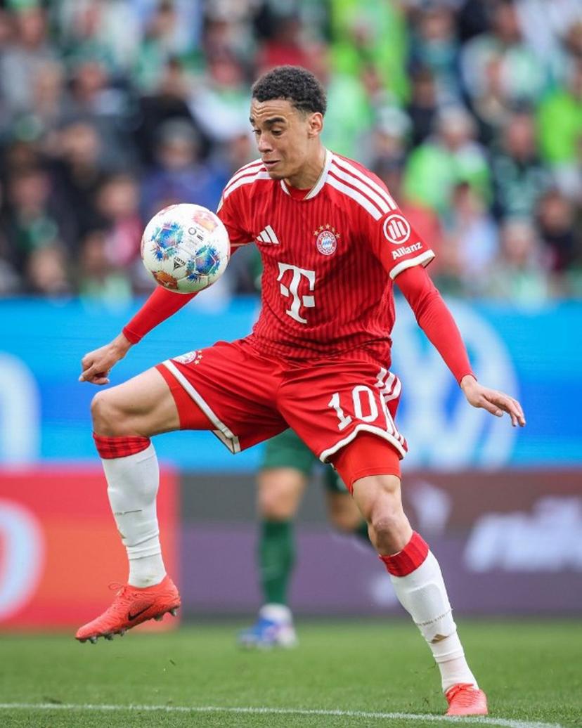 Bayern Munich's German midfielder #10 Jamal Musiala plays the ball during the German first division Bundesliga football match between VfL Wolfsburg and FC Bayern Munich in Wolfsburg, on May 9, 2026. Ronny HARTMANN / AFP