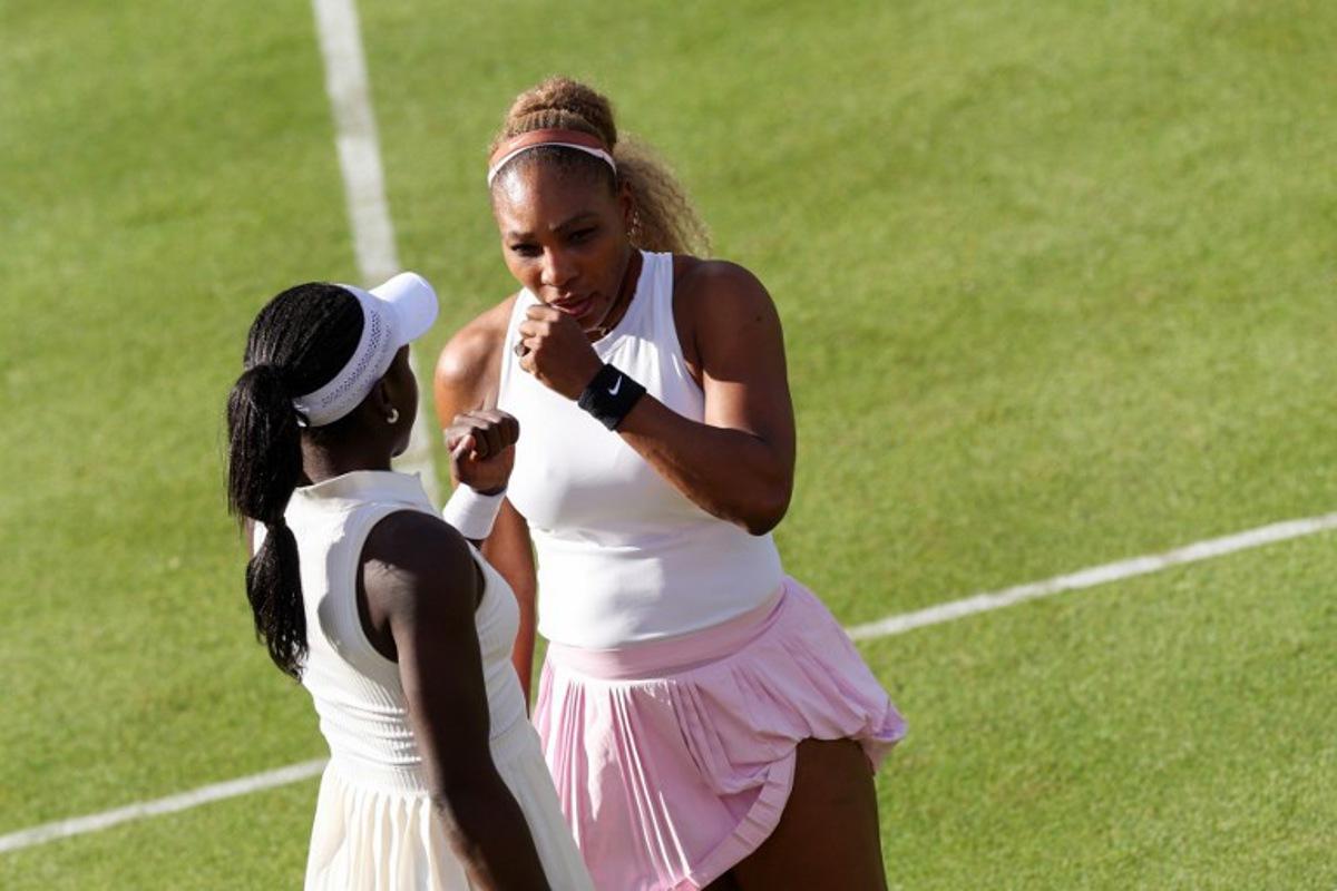 US player Serena Williams (R) strategizes with Canada's Victoria Mboko (L) during their match against US player Nicole Melichar-Martinez and New Zealand's Erin Routliffe during their round of 16, doubles match at the HSBC WTA tennis Championships at Queen's Club in west London on June 9, 2026. Adrian Dennis / AFP