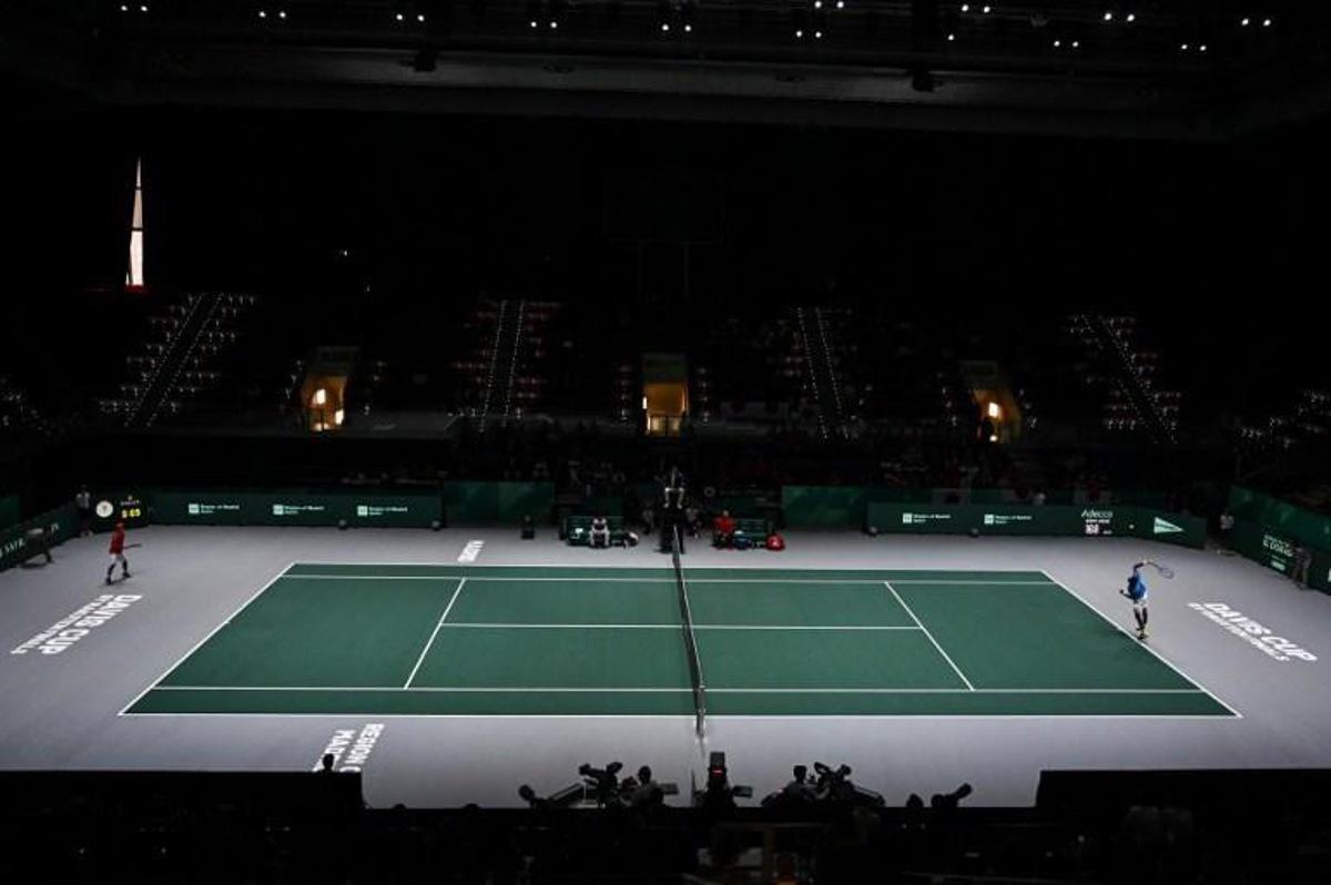 France's Gael Monfils (R) serves the ball to Japan's Yoshihito Nishioka during the singles tennis match between France and Japan at the Davis Cup Madrid Finals 2019 in Madrid on November 19, 2019. GABRIEL BOUYS / AFP