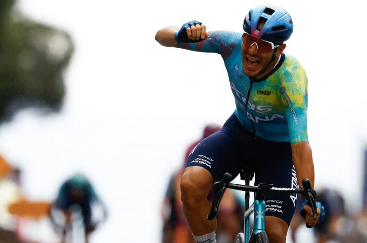 XDS Astana Team Italian rider Davide Ballerini celebrates as he crosses the finish line to win in the 6th stage of the Giro d'Italia 2026 - Tour of Italy cycling race between Paestum and Naples, southern Italy on May 14, 2026. Luca Bettini / AFP