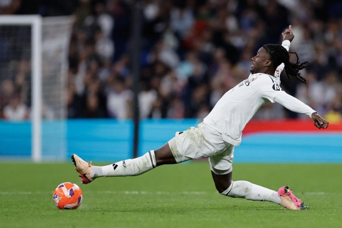 Real Madrid's French midfielder #06 Eduardo Camavinga controls the ball during the Spanish league football match between Real Madrid CF and Athletic Club Bilbao at the Santiago Bernabeu Stadium in Madrid, on April 20, 2025. OSCAR DEL POZO / AFP