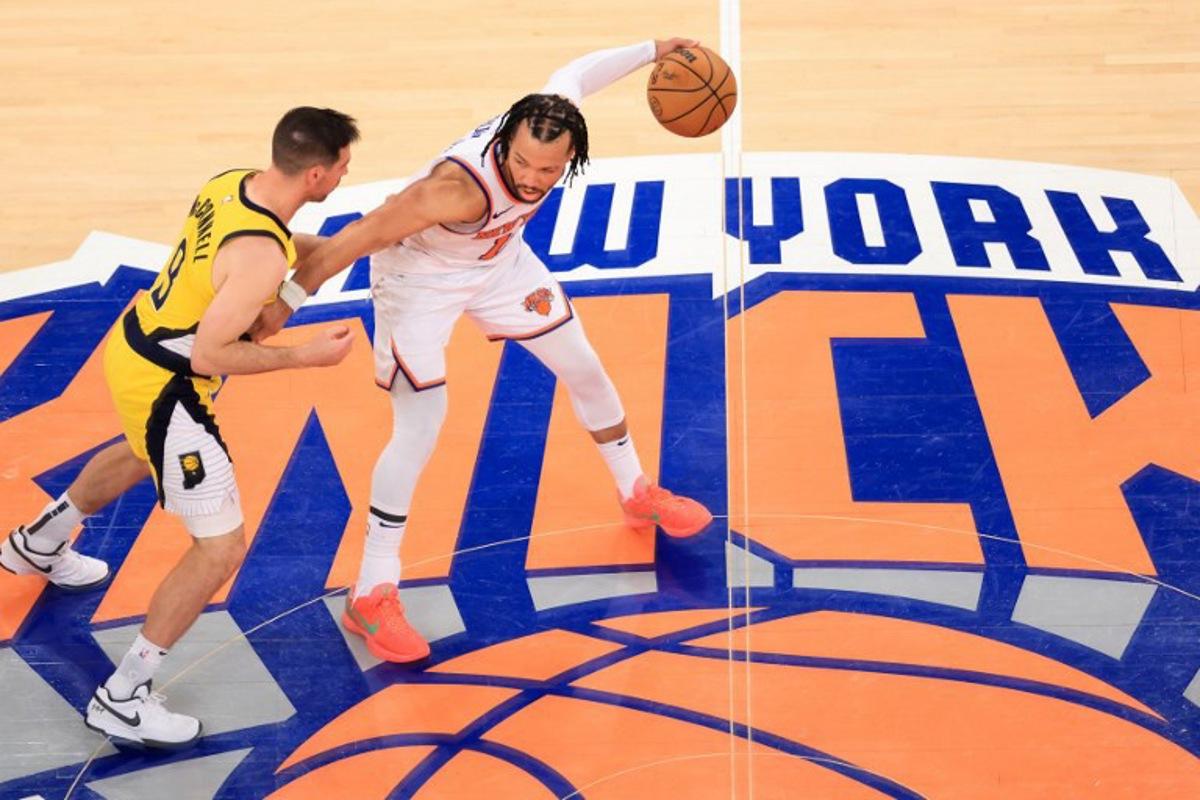 Knicks' point guard #11 Jalen Brunson (R) dribbles the ball under pressure from the Pacers' point guard #09 TJ McConnell (L) during Game Five of the Eastern Conference Finals of the 2025 NBA Playoffs between the New York Knicks and the Indiana Pacers at Madison Square Garden in New York on May 29, 2025. CHARLY TRIBALLEAU / AFP