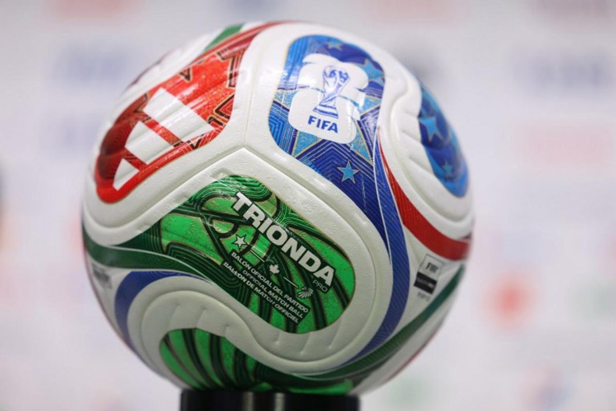 The 2026 World Cup official ball is displayed during a press conference at Monterrey stadium taken in Monterrey, on June 19, 2026, on the eve of the 2026 World Cup Group F football match between Tunisia and Japan. Julio Cesar AGUILAR / AFP