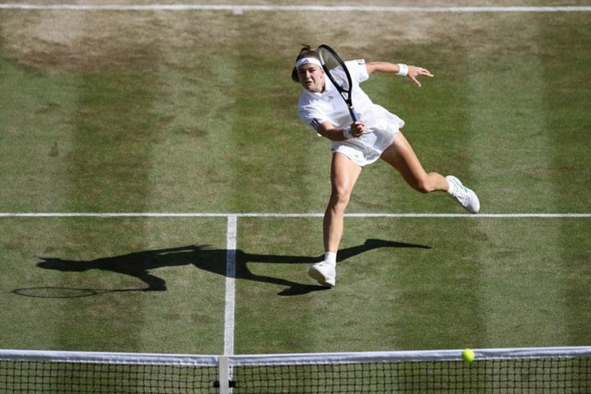 Czech Republic's Karolina Muchova returns against Japan's Naomi Osaka during their women's singles quarter-final tennis match on the ninth day of the 2026 Wimbledon Championships at The All England Lawn Tennis and Croquet Club in Wimbledon, southwest London, on July 7, 2026. Henry NICHOLLS / AFP