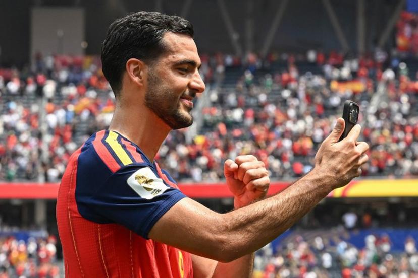 Spain's midfielder #06 Mikel Merino celebrates after winning the 2026 World Cup football tournament quarter-final match between Spain and Belgium at the Los Angeles Stadium in Inglewood on July 10, 2026. Paul ELLIS / AFP