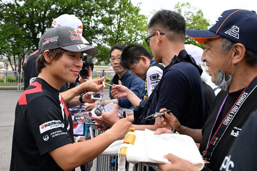 Toyota Gazoo Racing WRT team's Takamoto Katsuta of Japan meets fans during an autograph-signing session of the Rally Japan, the 7th round of the FIA World Rally Championships in Toyota city, Aichi prefecture on May 28, 2026. Toshifumi KITAMURA / AFP