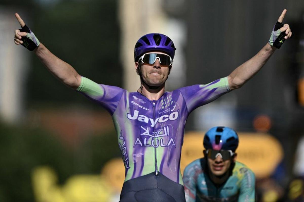 Team Jayco AlUla's Swiss rider Mauro Schmid cycles to the finish line ahead of XDS Astana Team's Colombian rider Harold Tejada (R) to win the 13th stage of the 113th edition of the Tour de France cycling race, 205,8 km between Dole and Belfort in eastern France, on July 17, 2026. Jeff PACHOUD / AFP
