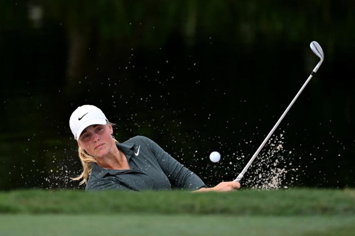 Sweden's Maja Stark watches her shot out of a bunker during the third day of the Maybank Championship golf tournament at the Kuala Lumpur Golf and Country Club in Kuala Lumpur on October 26, 2024. Mohd RASFAN / AFP