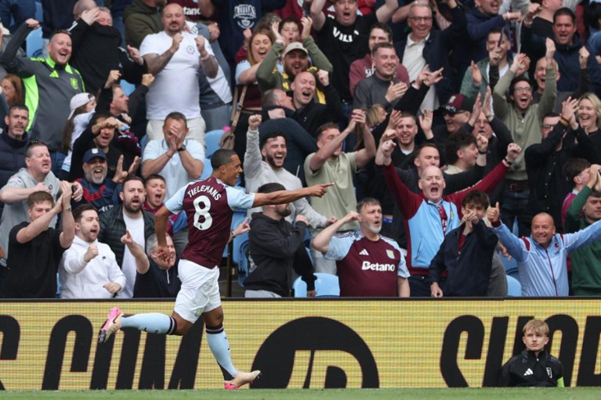 Aston Villa's Belgian midfielder #08 Youri Tielemans celebrates after scoring the opening goal during the English Premier League football match between Aston Villa and Fulham at Villa Park in Birmingham, central England on May 3, 2025. Adrian Dennis / AFP