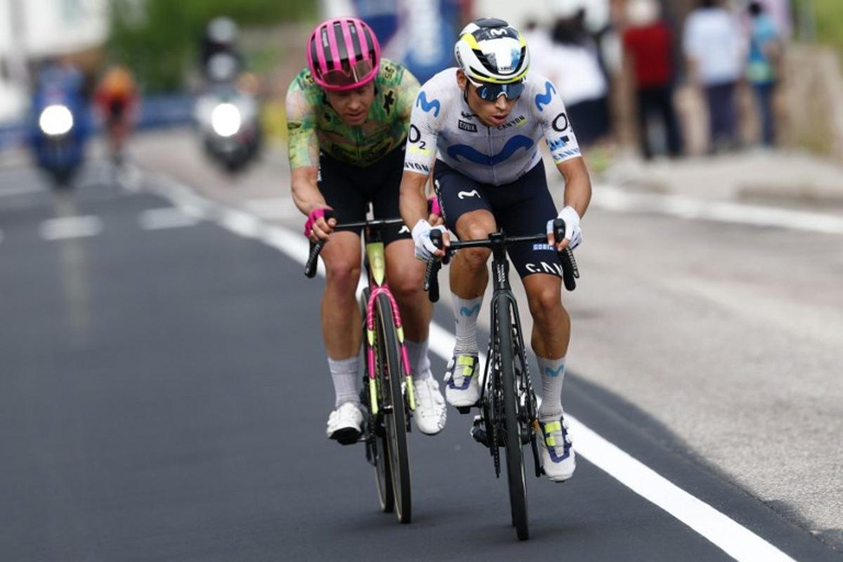 Movistar Team Colombian rider Einer Rubio (R) and EF Education - EasyPost Danish rider Michael Valgren ride at the front of the race during the 17th stage of the Giro d'Italia 2026 - Tour of Italy cycling race between Cassano d'Adda and Andalo, Italy, on May 27, 2026. Luca Bettini / AFP