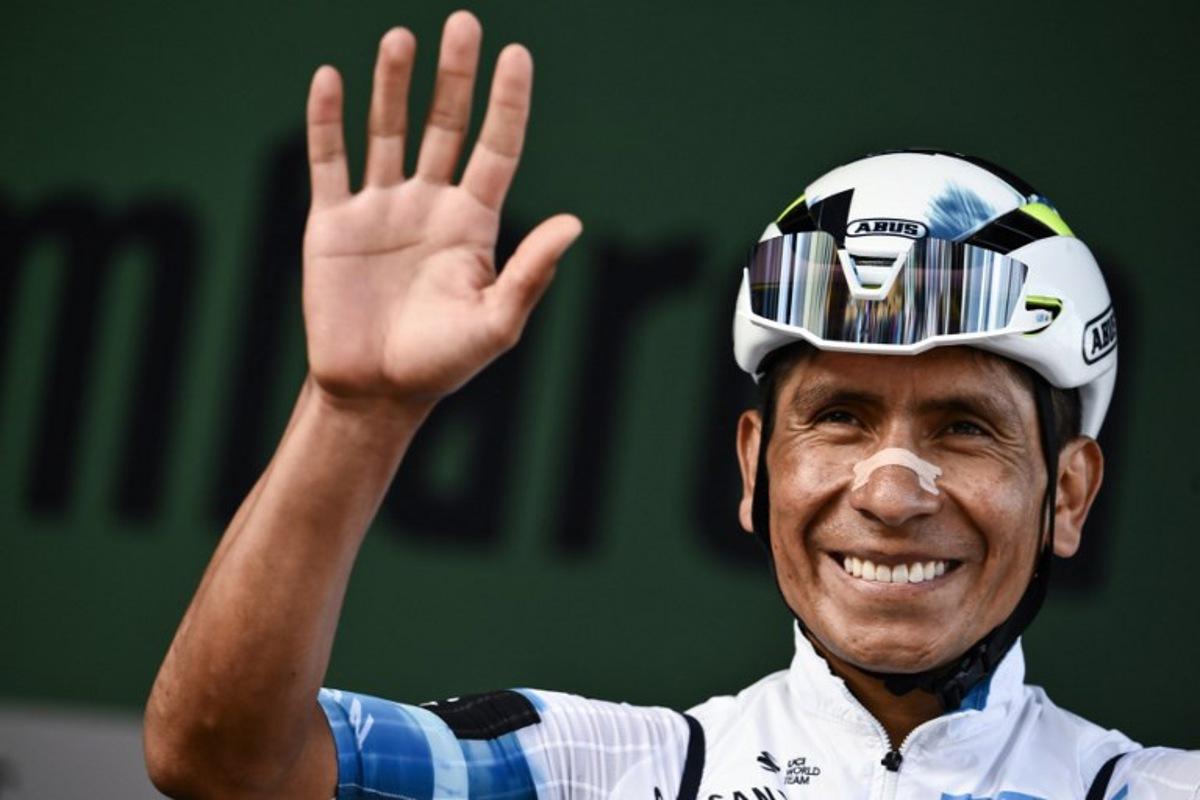 Movistar Team's Colombian riderNairo Quintana looks on from the sign-in podium ahead of the 119th edition of the Giro di Lombardia (Tour of Lombardy), a 238km cycling race from Como to Bergamo on October 11, 2025. Marco BERTORELLO / AFP