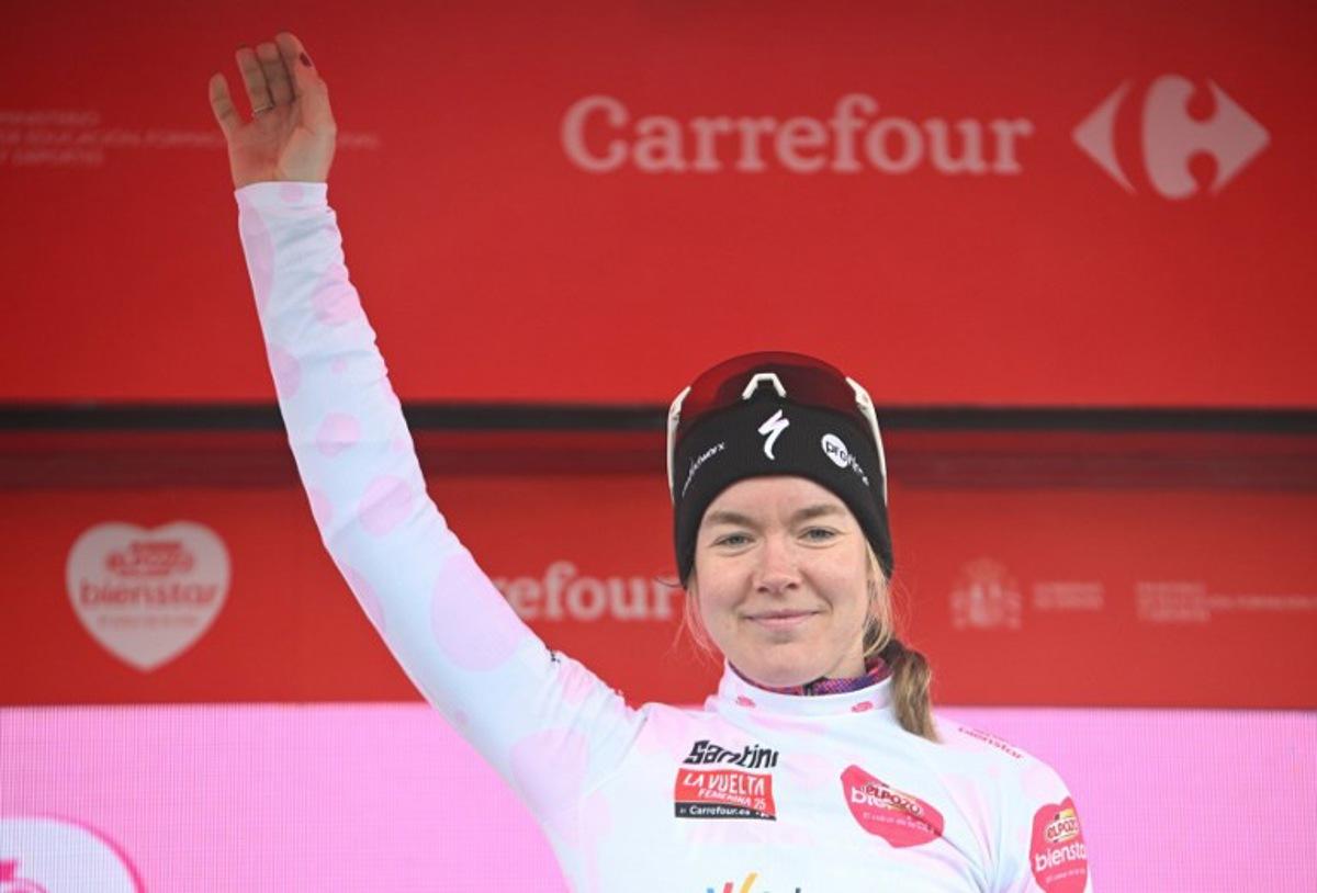 Third placed Team SD Worx Dutch rider Anna van der Breggen celebrates on the podium after the 7th stage of the 2025 La Vuelta Femenina cycling tour of Spain, a 152.6 km race from La Robla to Cotobello, on May 10, 2025. MIGUEL RIOPA / AFP