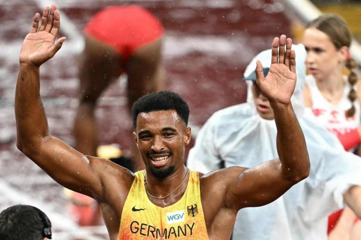 Germany's athlete Leo Neugebauer celebrates winning the men's decathlon after the 1500m event during the World Athletics Championships in Tokyo on September 21, 2025. Philip FONG / AFP