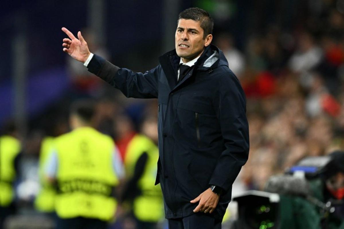 Portugal's head coach Francisco Neto gestures from the techincal area during the UEFA Women's Euro 2025 Group B football match between Portugal and Italy at the Stade de Geneve in Geneva, on July 7, 2025. Fabrice COFFRINI / AFP