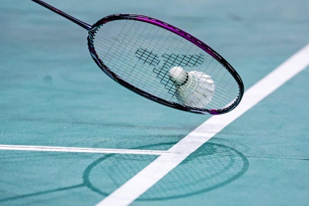 Japan's Kenta Nishimoto hits a return to India's Srikanth Kidambi during their men's singles match on day two of the Australia Open badminton tournament in Sydney on August 2, 2023. DAVID GRAY / AFP