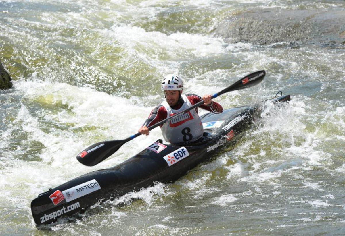 French Theo Devard competes in the Kayak K1 men race at the ICF Wildwater Canoeing Sprint World in the southern German city of Augsburg, on June 12, 2011. AFP PHOTO/CHRISTOF STACHE CHRISTOF STACHE / AFP