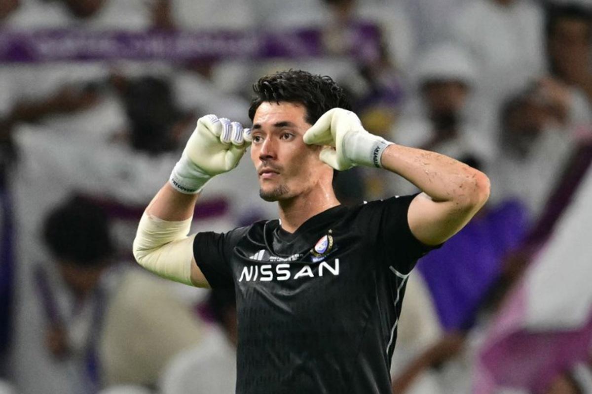 Yokohama's Japanese goalkeeper #42 William Popp leaves the pitch after receiving a red card during the second leg of the AFC Champions League Final between UAE's Al Ain and Japan's Yokohama F. Marinos at the Hazza Bin Zayed Stadium in Al-Ain on May 25, 2024. Giuseppe CACACE / AFP
