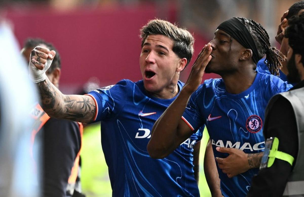 Chelsea's Argentinian midfielder #08 Enzo Fernandez (L) and Chelsea's English midfielder #11 Noni Madueke celebrate their team's goal during the English Premier League football match between Nottingham Forest and Chelsea at The City Ground in Nottingham, central England, on May 25, 2025. Ben STANSALL / AFP