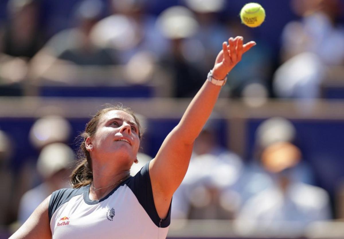 US' Emma Navarro eyes the ball while serving to Canada's Victoria Mboko during their women's singles final tennis match on day 7 of the WTA 500 Internationaux de Strasbourg tournament on Court Central at the Tennis Club de Strasbourg, eastern France on May 23, 2026. ROMEO BOETZLE / AFP