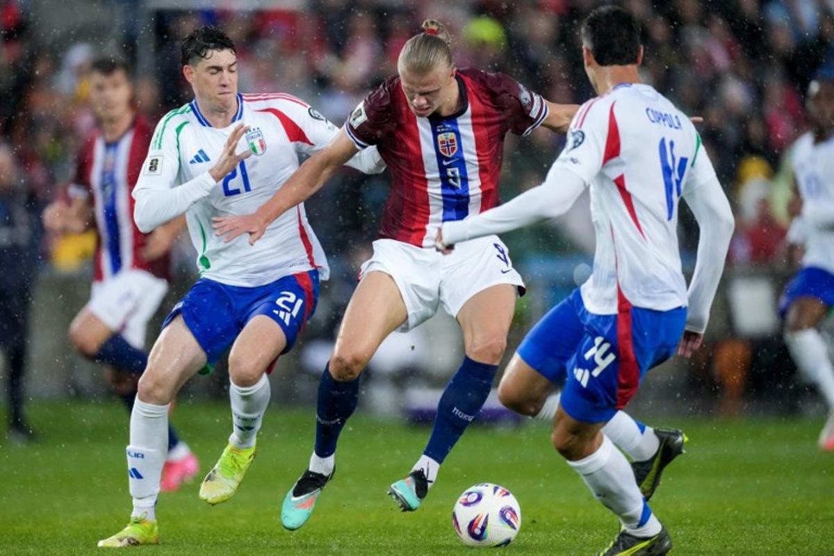 Italy's defender #21 Alessandro Bastoni (L), Norway's forward #09 Erling Braut Haaland and Italy's defender #14 Diego Coppola vie for the ball during the 2026 FIFA World Cup Qualifying Group I football match between Norway and Italy at the Ullevaal Stadium in Oslo on June 6, 2025. Cornelius Poppe / NTB / AFP